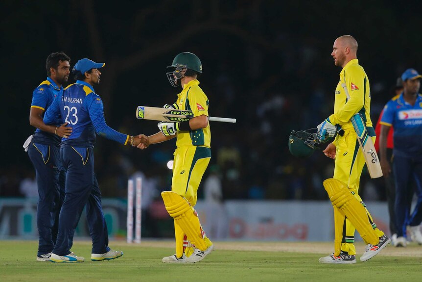 Australia's Adam Zampa shakes hands with Sri Lanka's Tillakaratne Dilshan after Dambulla ODI