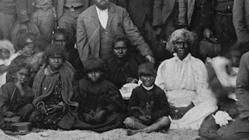 Old photo of Aboriginal women and children in group photo