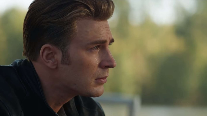 Chris Evans's Steve Rogers looks sadly into the distance in the Avengers: Endgame trailer.