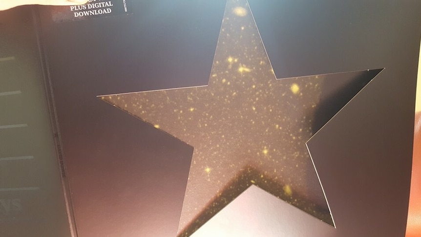The cover of David Bowie's Blackstar album, showing a star field appearing.