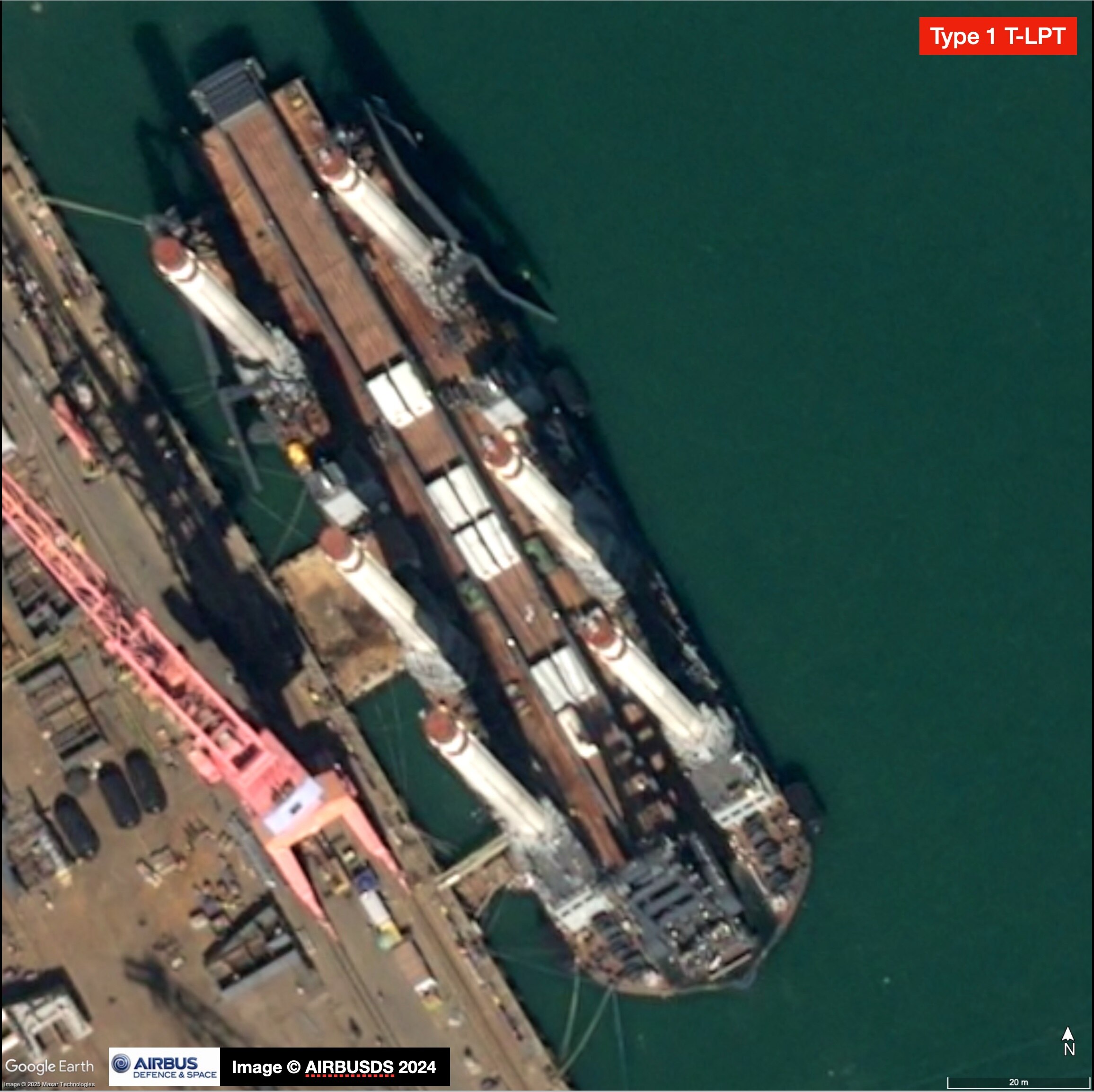 A satellite photo showing a landing barge being built in a Chinese port