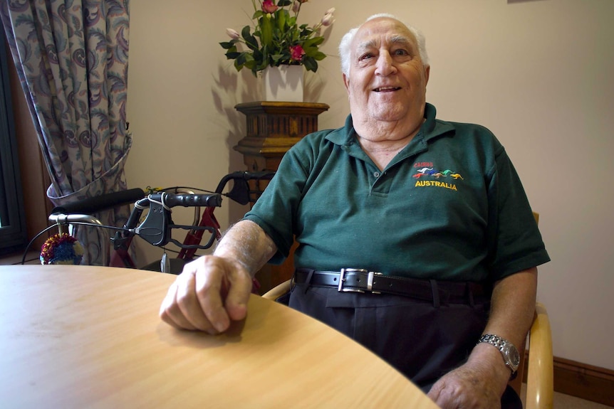 Salvatore Trimboli wears a green shirt