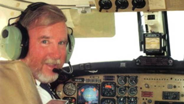 Pilot Max Quartermain in the cockpit of a light plane.