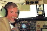 Pilot Max Quartermain in the cockpit of a light plane.
