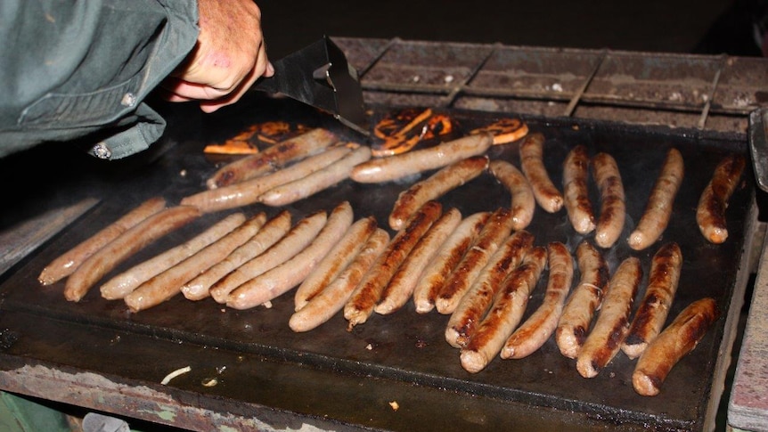 Sausages on a BBQ.