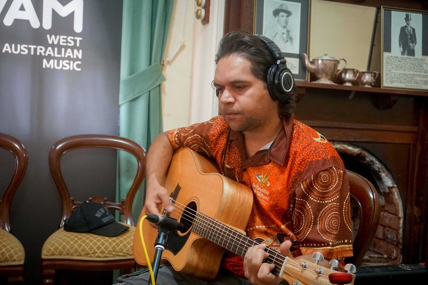 Burt Hayden recording his song during the WAM project.