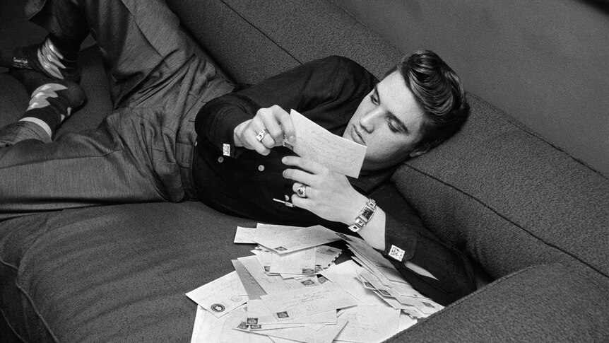 Reading fan letters, New York City. March, 17, 1956.