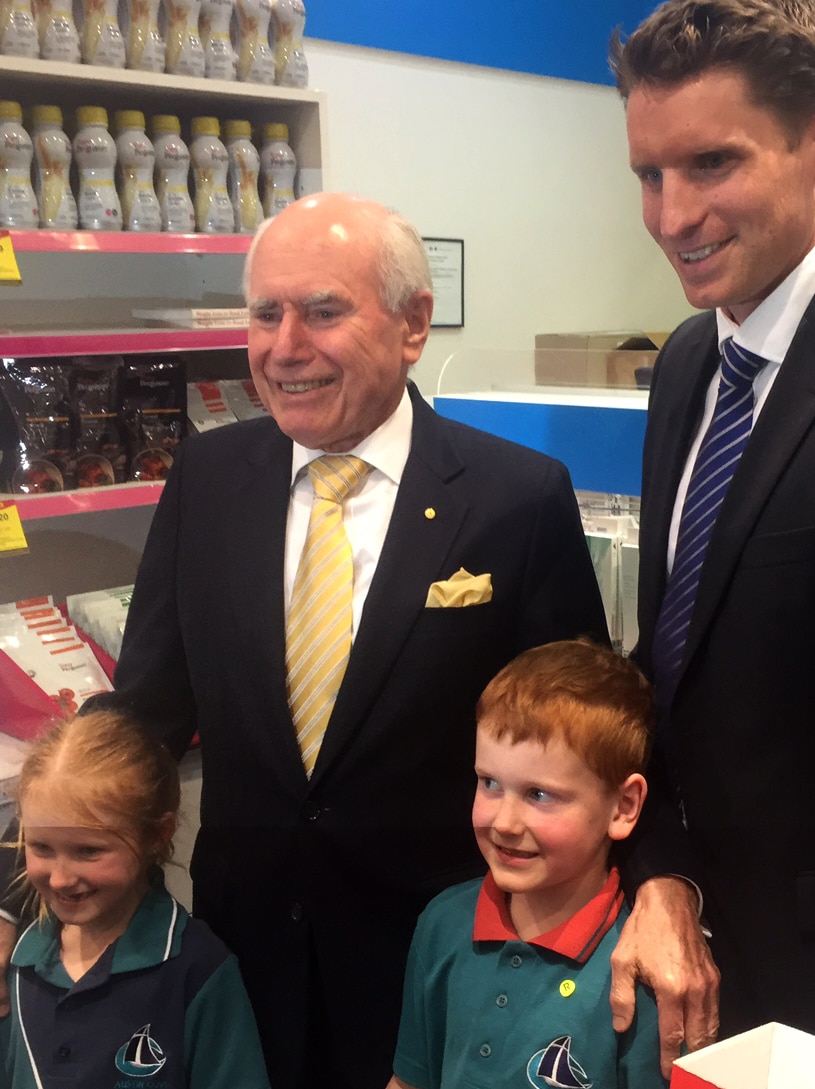 Former Prime Minister John Howard and Andrew Hastie with children in Mandurah