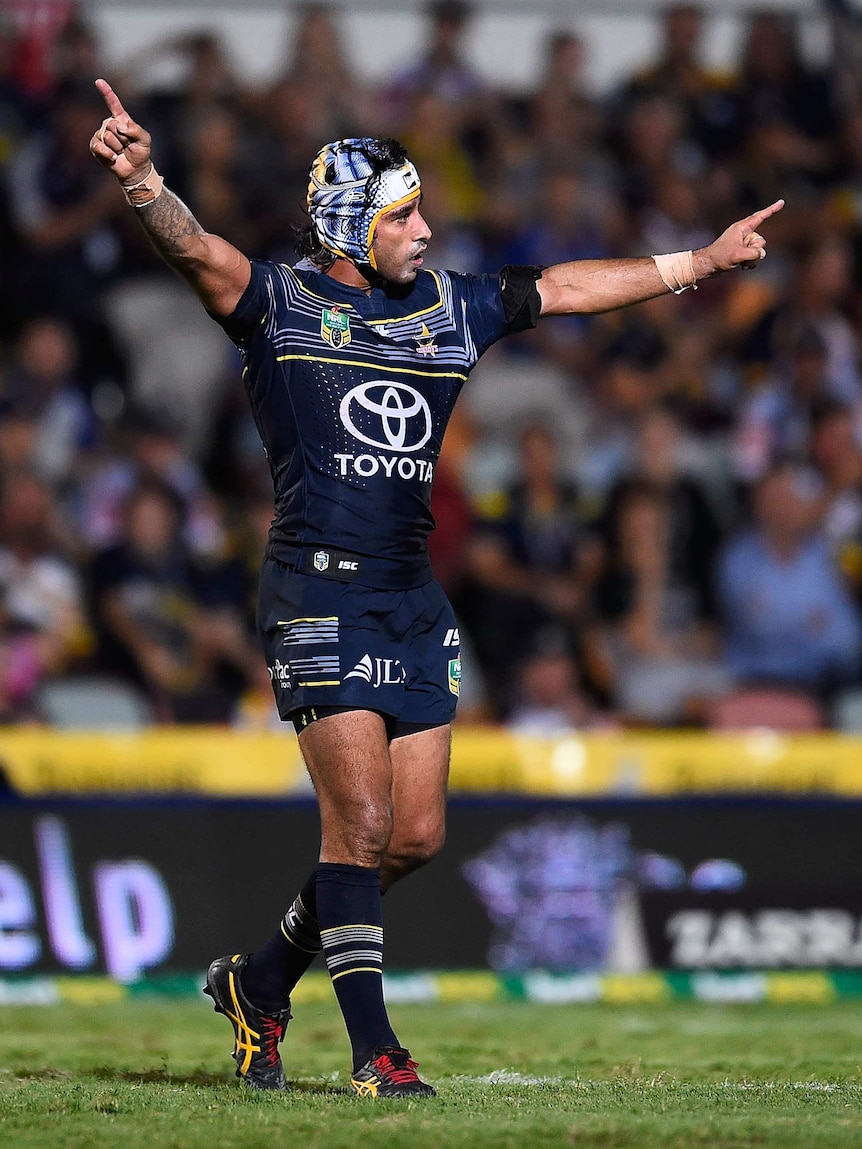 Johnathan Thurston celebrates his game-winning field goal