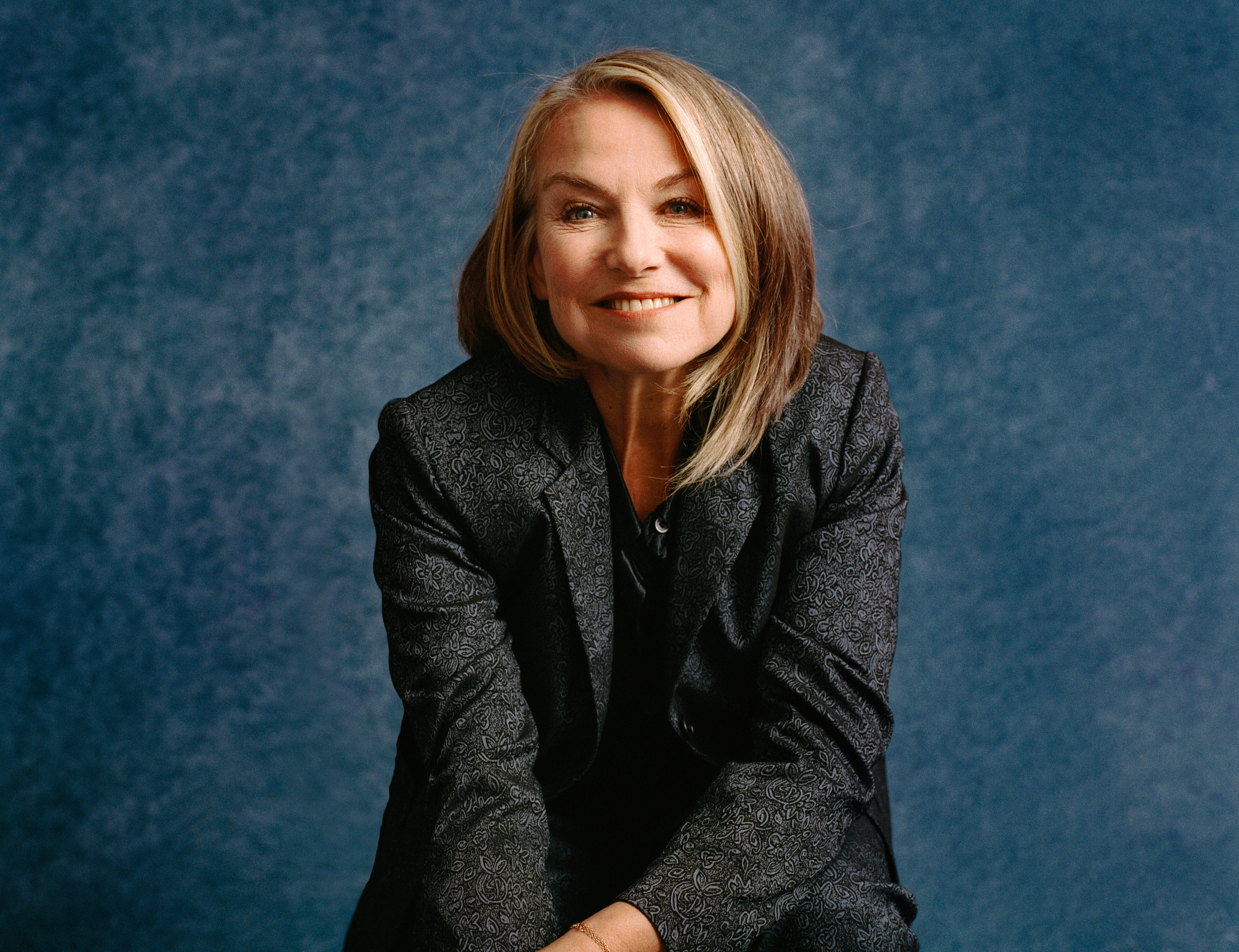 Image of psychotherapist Esther Perel. She's smiling at the camera.
