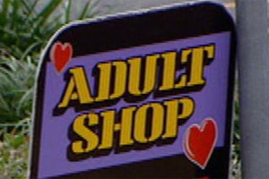 A sign advertising an Adult Shop
