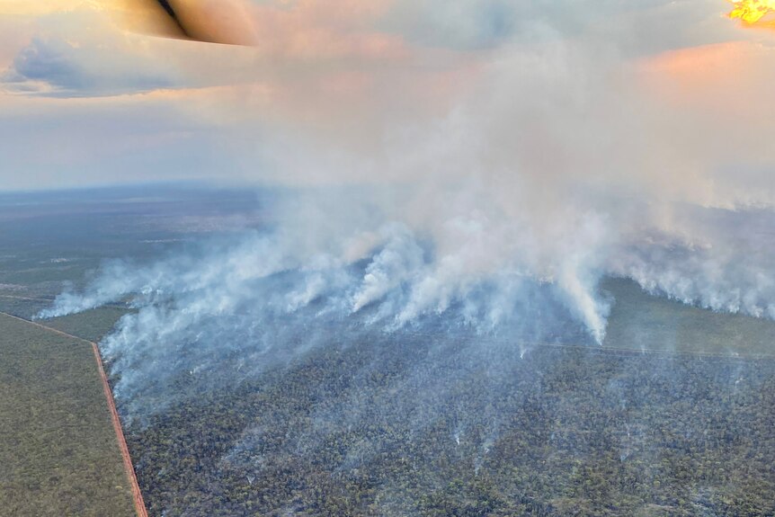 An aerial view of smoky fires in the NT