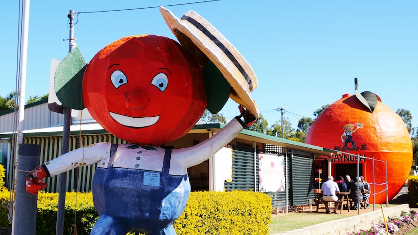 Dan the orange man and the Big Orange in Gayndah, Queensland.