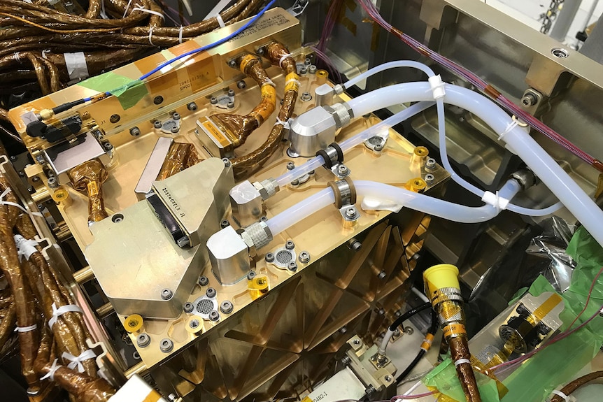 Mars Oxygen In-Situ Resource Utilization Experiment Instrument shines after being installed inside the Perseverance rover. 