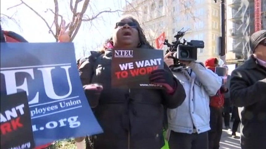 Angry furloughed government workers protested the shutdown on its 20th day.