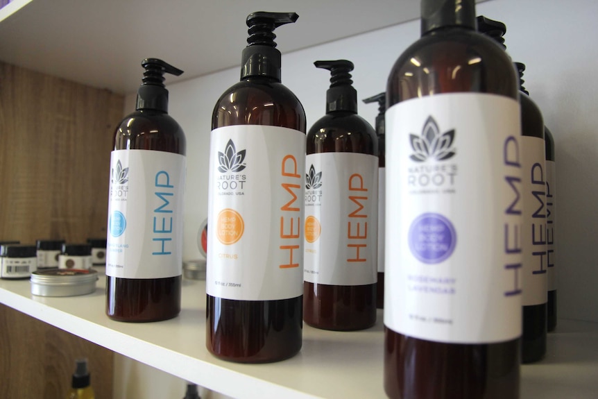 Some hemp moisturisers lined up on a shelf