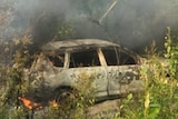 The burnt out car used by the teenagers