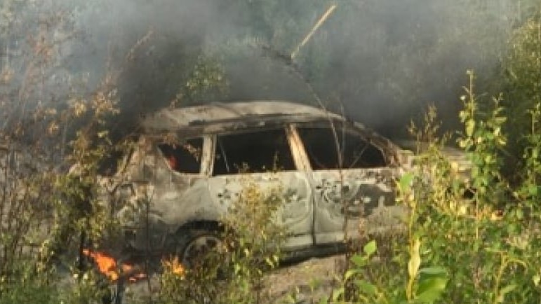 The burnt out car used by the teenagers