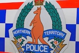 The Northern Police logo on the side of a police van.