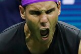 Rafael Nadal bends his knees and clenches his fists and screams