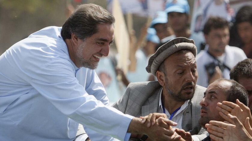 Abdullah Abdullah is mobbed by supporters in in Balkh province