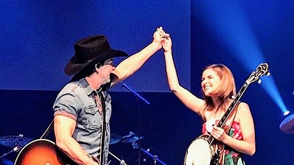 Taylor Pfeiffer on stage with Lee Kernaghan
