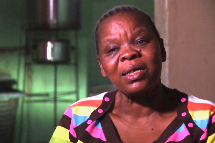 Head and shoulders shot of African woman speaking.