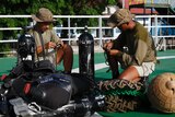 Indonesia Marine divers prepare their gear in search operations for AirAsia flight QZ8501, January 1, 2015