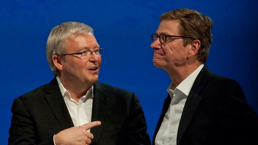 Kevin Rudd (left) speaks to German foreign minister Guido Westerwelle
