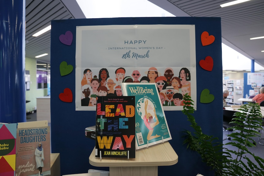 Two books in display, one named "Lead The Way".