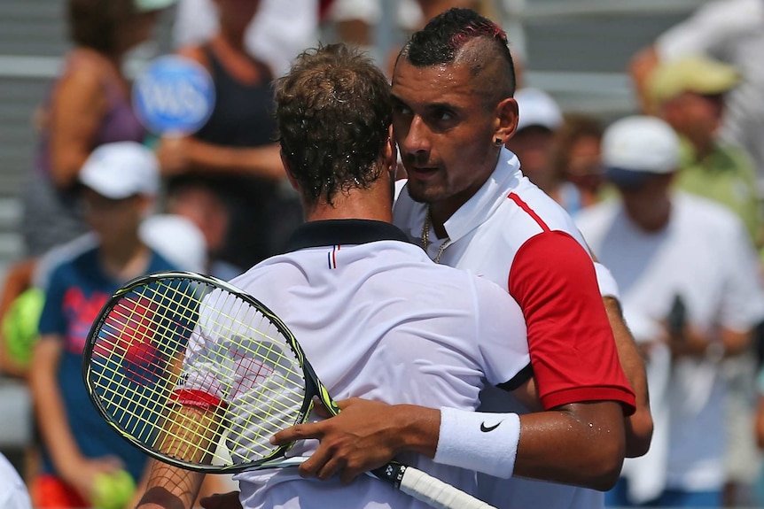 Nick Kyrgios embraces Richard Gasquet after losing in Cincinnati