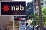 NAB signs hang from the bank's building in Brisbane