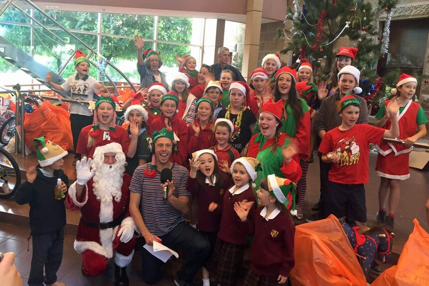 The elves with Ryk Goddard and Santa