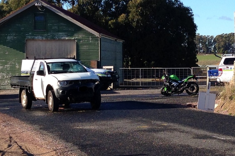 Ute and motorbike at fatal crash scene in Spreyton.