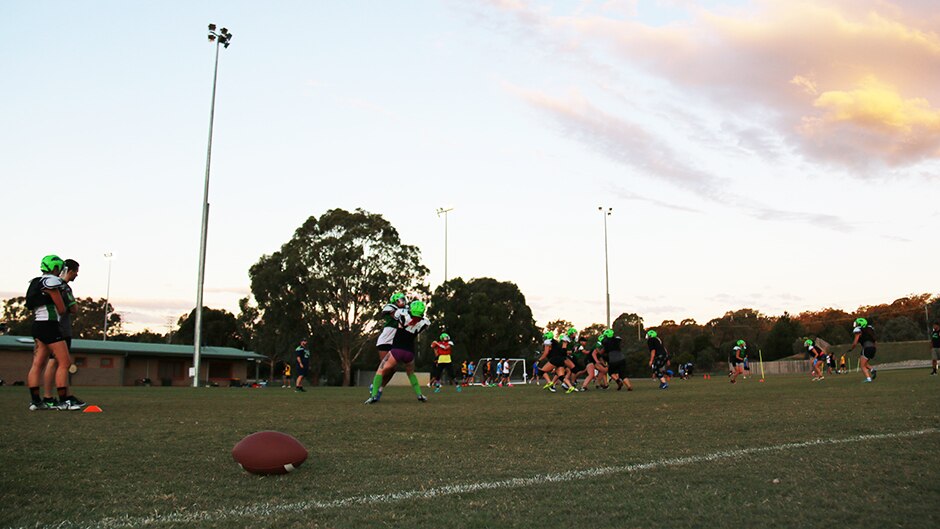 Dusk falls over the Australian Institute of Sport as the Canberra Mustangs finish training.