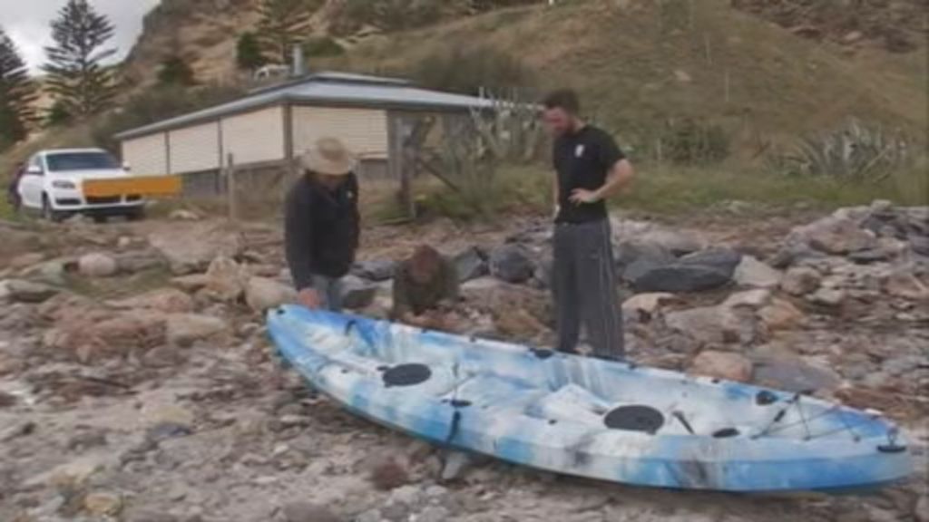 Shark knocks terrified 15-year-old girl out of her kayak in