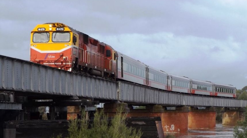 A morning V/Line service to Bairnsdale, crossing the Avon River Rail Bridge at Stratford.