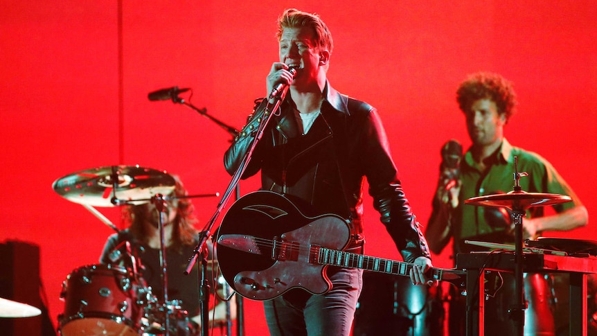 Queens of the Stone Age perform