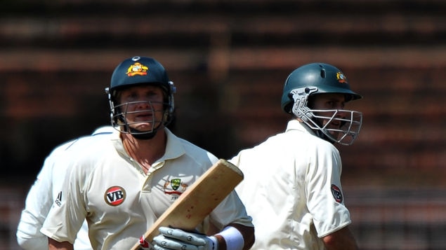 Australian openers Shane Watson and Simon Katich run between wickets in Chandigarh.