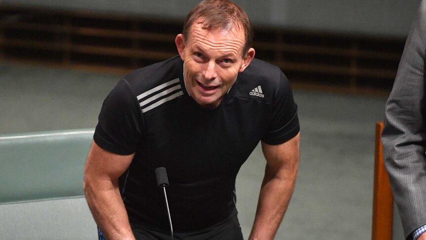 Liberal MP Tony Abbott wears sports clothing during a division in the House of Representatives.