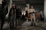 Rebel fighters in Aleppo