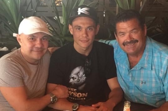 Kostya Tszyu, Tim Tszyu and Glen Jennings sit at a table