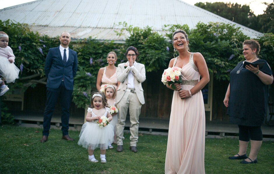 Selina's breath is taken away as she sees Amanda walking down the aisle.