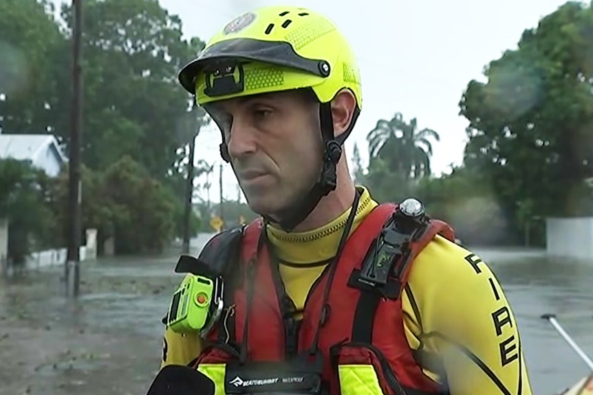 A firefighter involved in flood rescues in Townsville