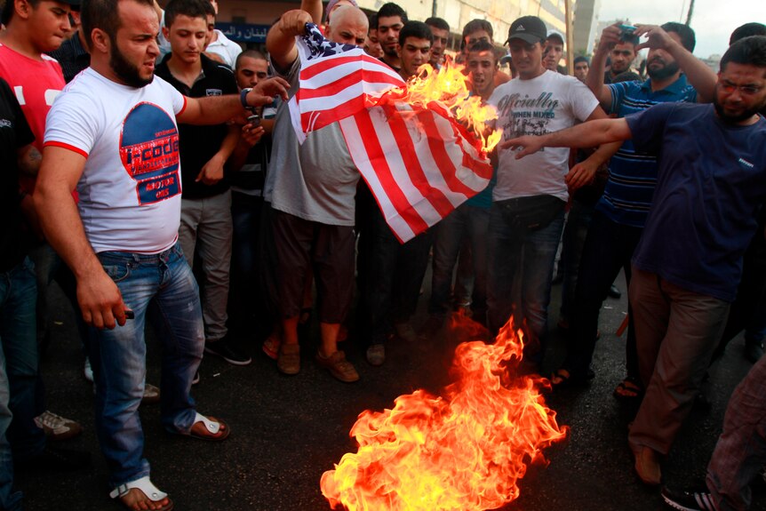 Protesters burn the US flag in Lebanon