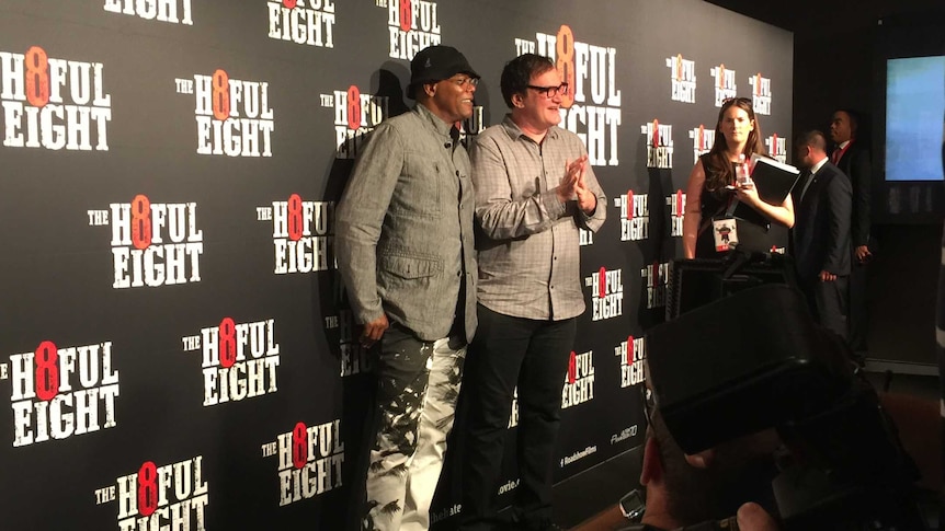 Samuel L. Jackson and Quentin Tarantino pose for photos.