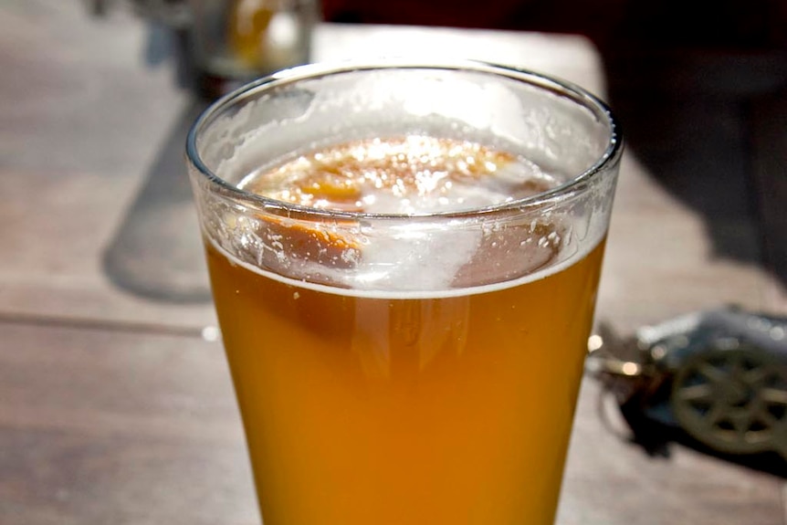 A pint of Lager, a type of German beer that is fermented and conditioned at low temperatures.