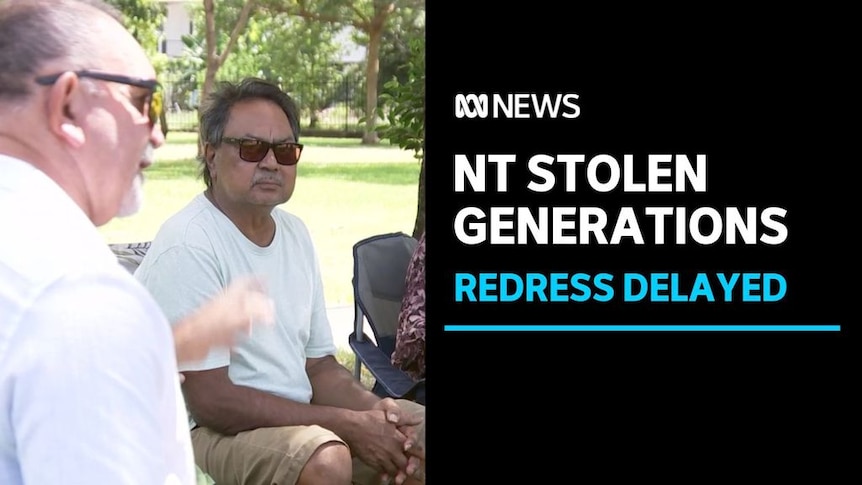 NT Stolen Generations, Redress Delayed: A man in sunglasses sits in a circle listening.