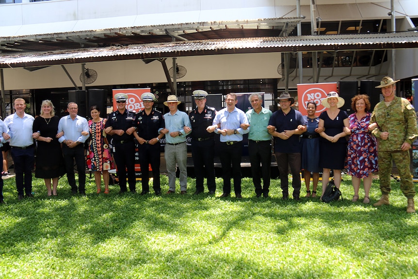 Police, politicians and personalities link arms on White Ribbon Day in Darwin