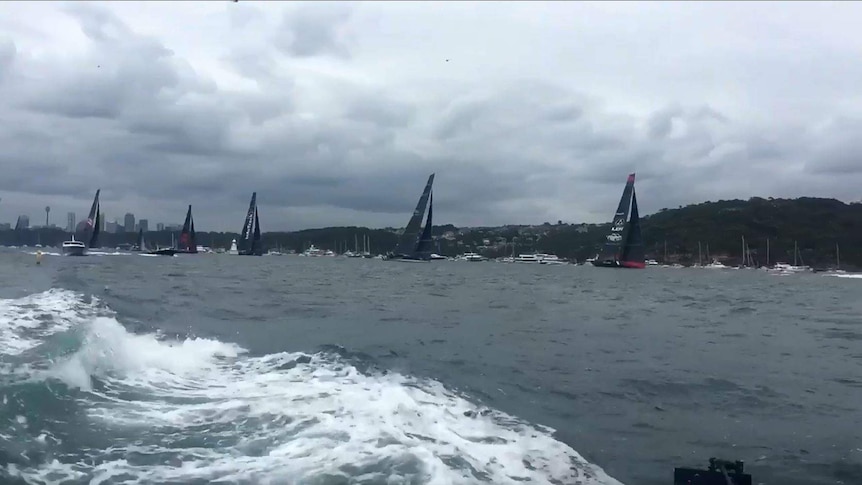 LDV Comanche (R) and Black Jack (2R) lead after the start of Sydney-to-Hobart on December 26, 2017.